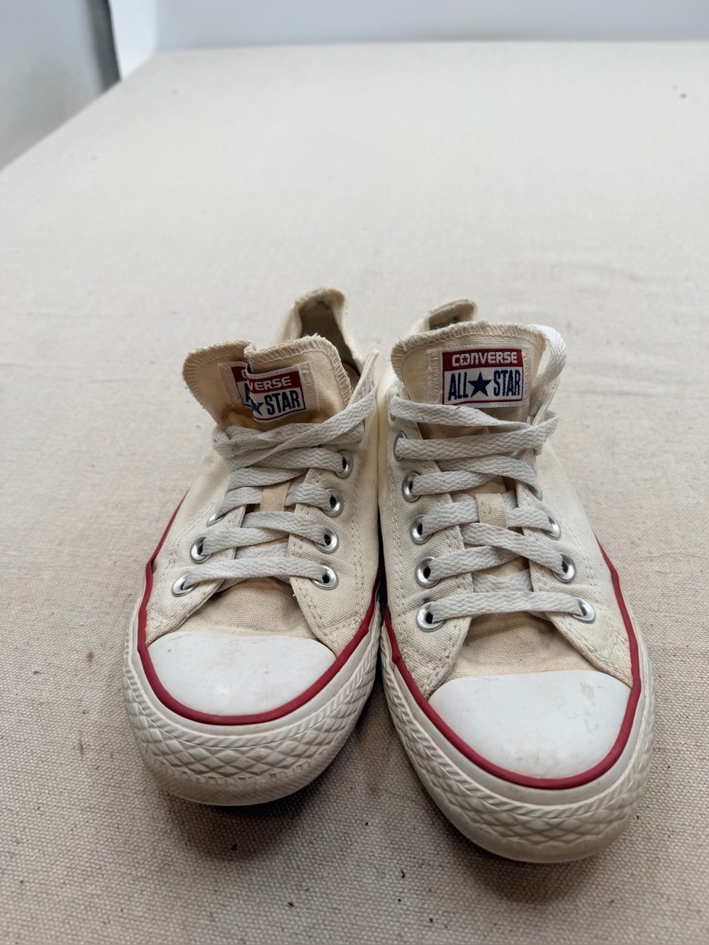 Converse  Low Top Sneakers in Cream with Red Accent
